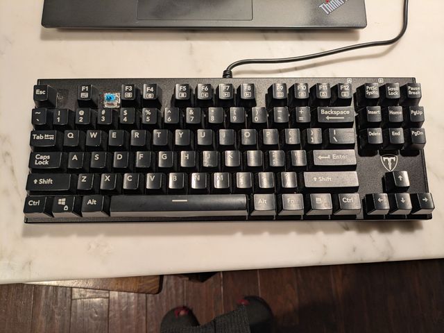 A cheap but surprisingly good mechanical keyboard. Heavy as hell
